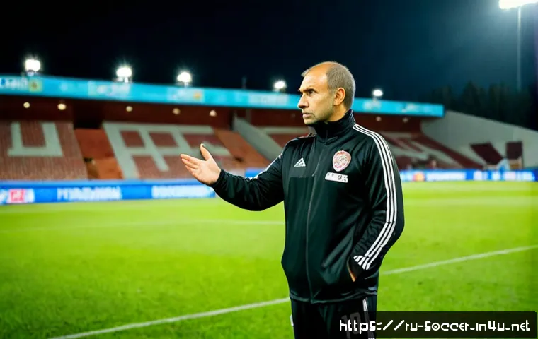 Home 17 축구 클럽 매니저 역할 - Photorealistic football club manager in a smart dark tracksuit standing beside a green pitch during ...